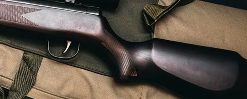 Wood rifle stock image